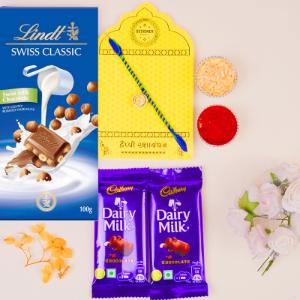 Auspicious Coin, Double Dairy Milk & Lindt Indulgence - Rakhi and Chocolates to USA