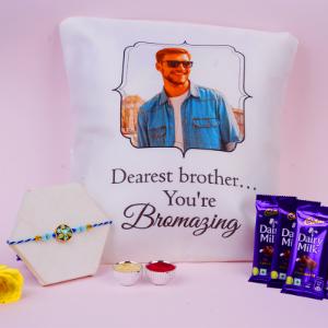 Ethnic Blue Stone Rakhi with Custom Cushion & Dairy Milk Trio
