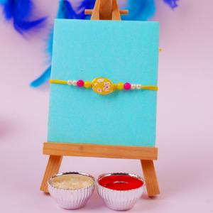 Whispering Pista Elegance Stone Rakhi