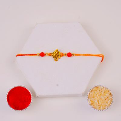 Auspicious Golden Ganesha Rakhi - Single Rakhi to USA