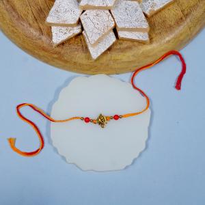 Regal Golden Ganesha Rakhi & Kaju Katli