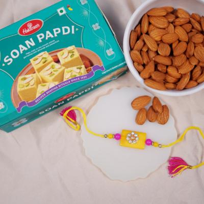 Vibrant Tradition & Golden Delights Rakhi - Rakhi and Dry Fruits to USA