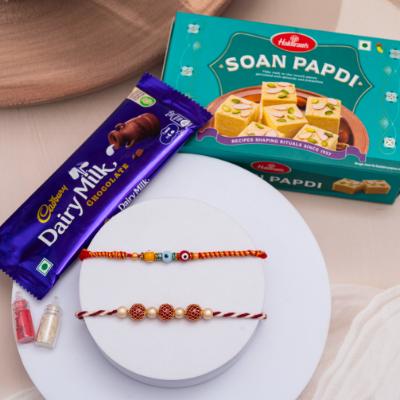 Vibrant Protection Rakhi Duo & Sweet Delights