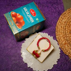 Red Kada Rakhi for Bhabhi with Gulab Jamun