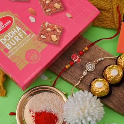 Traditional Charm & Superhero Fun Rakhi Combo with Sweets