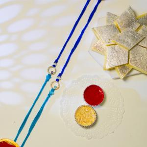 Twin Azure Eye Protection Rakhi Set & Kaju Katli