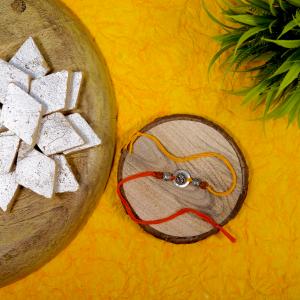 ganesha oxidised metal rakhi with kaju katli