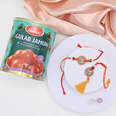 Divine Ganesha & Sweet Indulgence Rakhi Set