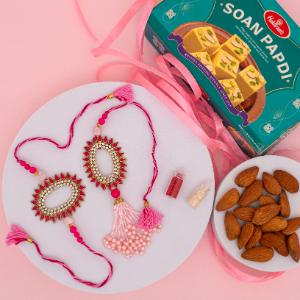 Pink Pearl Rakhi Set with Sweets & Almonds