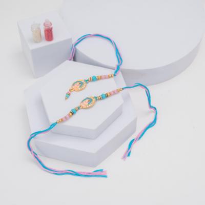 Vibrant Ethnic Bhaiya Bhabhi Rakhi Pair