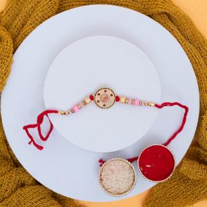 Sacred Om, Golden Feast & Wholesome Crunch - Rakhi and Chocolates to USA
