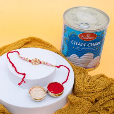Serene Om Symbol Rakhi & Cham Cham Delight