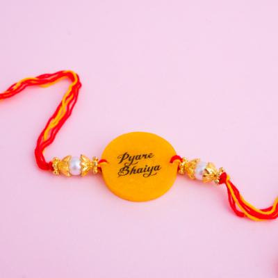 Beloved Bhaiya Yellow Charm Rakhi - Single Rakhi to USA