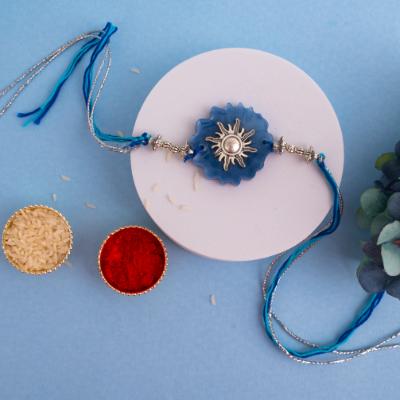 Solar Shine Blue Surya Resin Rakhi - Single Rakhi to USA