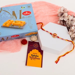 Traditional AD Ganesha Rakhi with Milk Cake