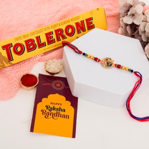 Shrinathji Blessings Rakhi with Toblerone Treat