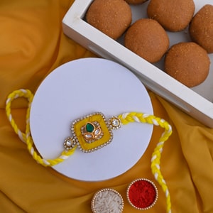 Nature-Inspired Leaf Motif Rakhi with Besan Laddu