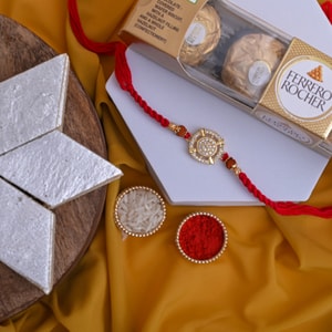 Sacred AD Rudraksha Chakra Rakhi with Kaju Katli