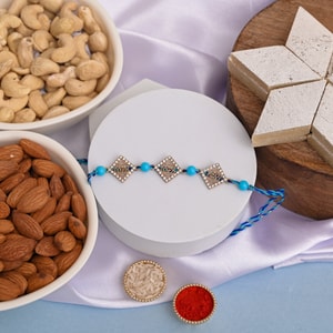 Floral Celebration Rakhi with Kaju Katli & Dry Fruits