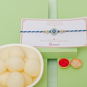 Evil Eye Floral Rakhi & Rasgulla