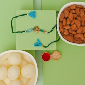 Peacock Charm Rakhi with Rasgulla & Almonds