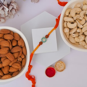 Rudraksha Evil Eye Rakhi with Cashew & Almonds