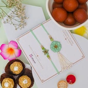 Floral Bhaiya Bhabhi Rakhi with Ferrero & Gulab Jamun