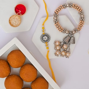 Floral Bhaiya Bhabhi Rakhi with Besan Laddu
