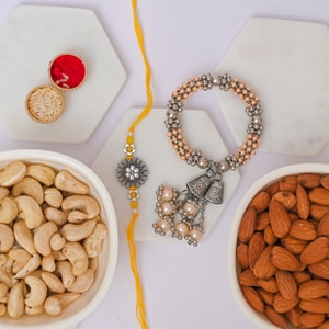 Floral Bhai Bhabhi Rakhi with Almonds & Cashews