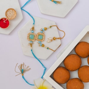 Aqua Bhaiya Bhabhi Rakhi with Besan Sweet