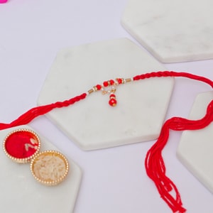 Ruby Pearl Lumba Rakhi for Bhabhi