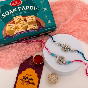 Silver Bloom Rakhi & Soan Papdi Hamper