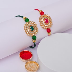 Royal Kundan Rakhi Duo with Gemstone Accents