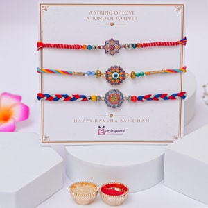 Elegant Spiritual Rakhi Set of Three - Set of 3 Rakhis to Australia
