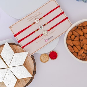 Om Ganesha Rakhi Trio with Kaju Katli & Almonds