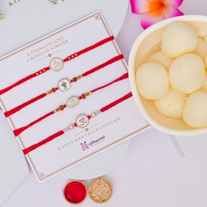 Sacred Om Ganesha Rakhi Set of Four with Rasgulla