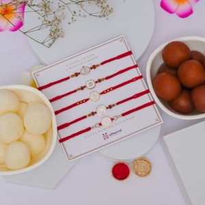 Divine Om Ganesha Rakhi Set with Traditional Sweets