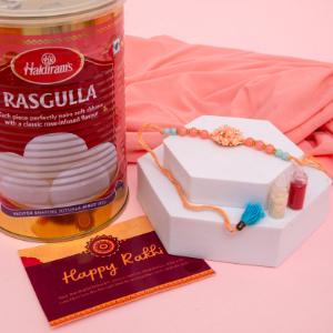 Orange Floral Rakhi with Rasgulla