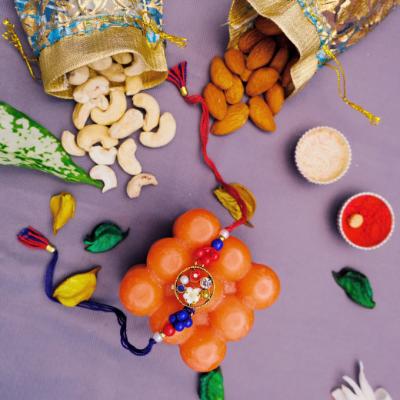 Bouquet of Affection & Wholesome Crunch Rakhi - Rakhi and Dry Fruits to USA