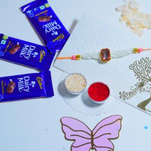 Golden Glow & Triple Dairy Milk Delight Rakhi