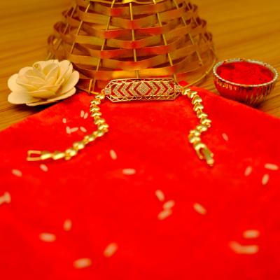 Regal Bond Golden Bracelet Rakhi