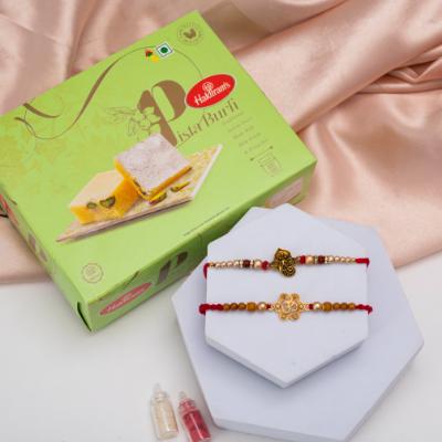 Ganesha & Om Rakhi Set with Pista Burfi