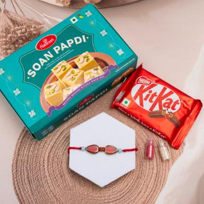 Crimson Sparkle Rakhi & Sweet Indulgence