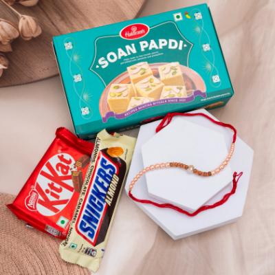 Earthy Elegance Pearl Rakhi & Sweet Delights - Rakhi Sweets to USA