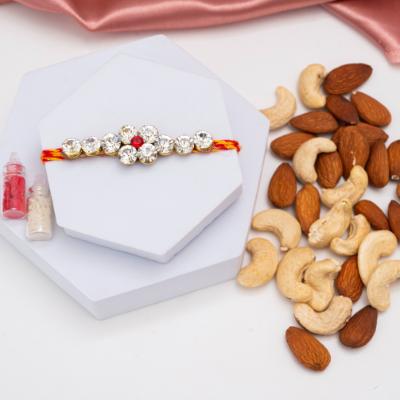Elegant Stone & Wholesome Duo Rakhi - Rakhi and Dry Fruits to USA