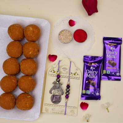 Purple Kundan Rakhi Combo with Sweets & Chocolates
