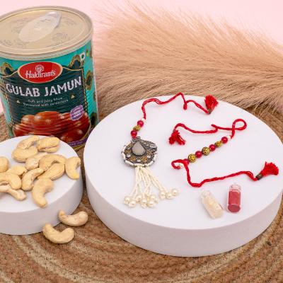 Crimson Charm & Sweet Indulgence Rakhi Set