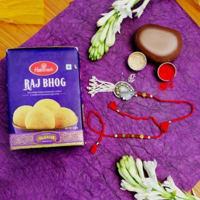 Crimson Glow Milky Stone & Rajbhog Delight Rakhi
