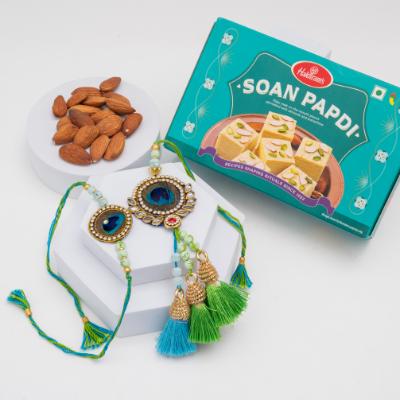 Regal Peacock Rakhi Set with Soan Papdi & Almonds