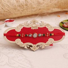Scintillating AD Stone Rakhi